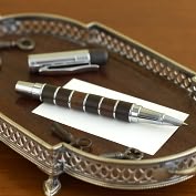 Product Image. Title: Walnut and Chrome Striped Rollerball Pen